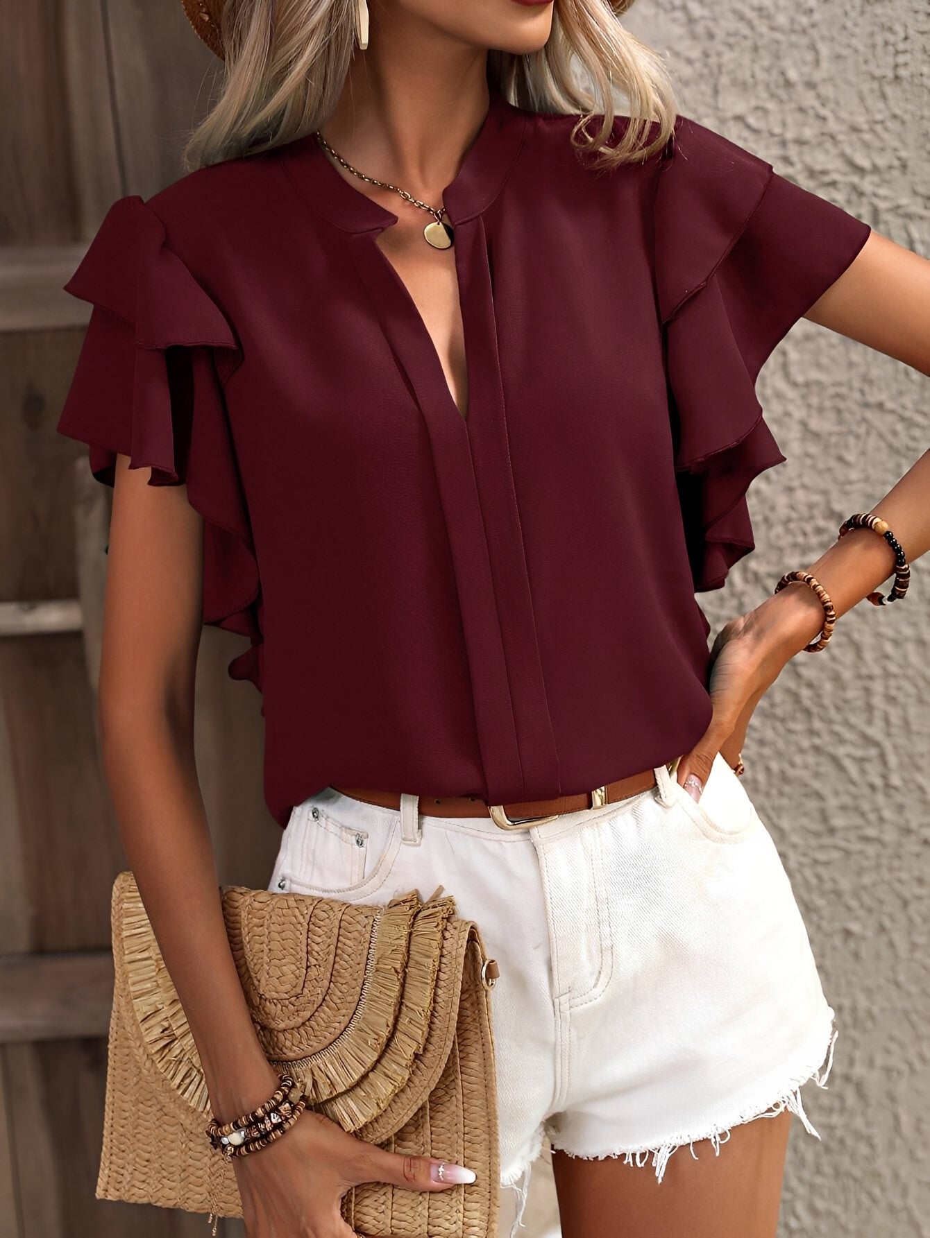Louisa - Blouse à col en V sans manches