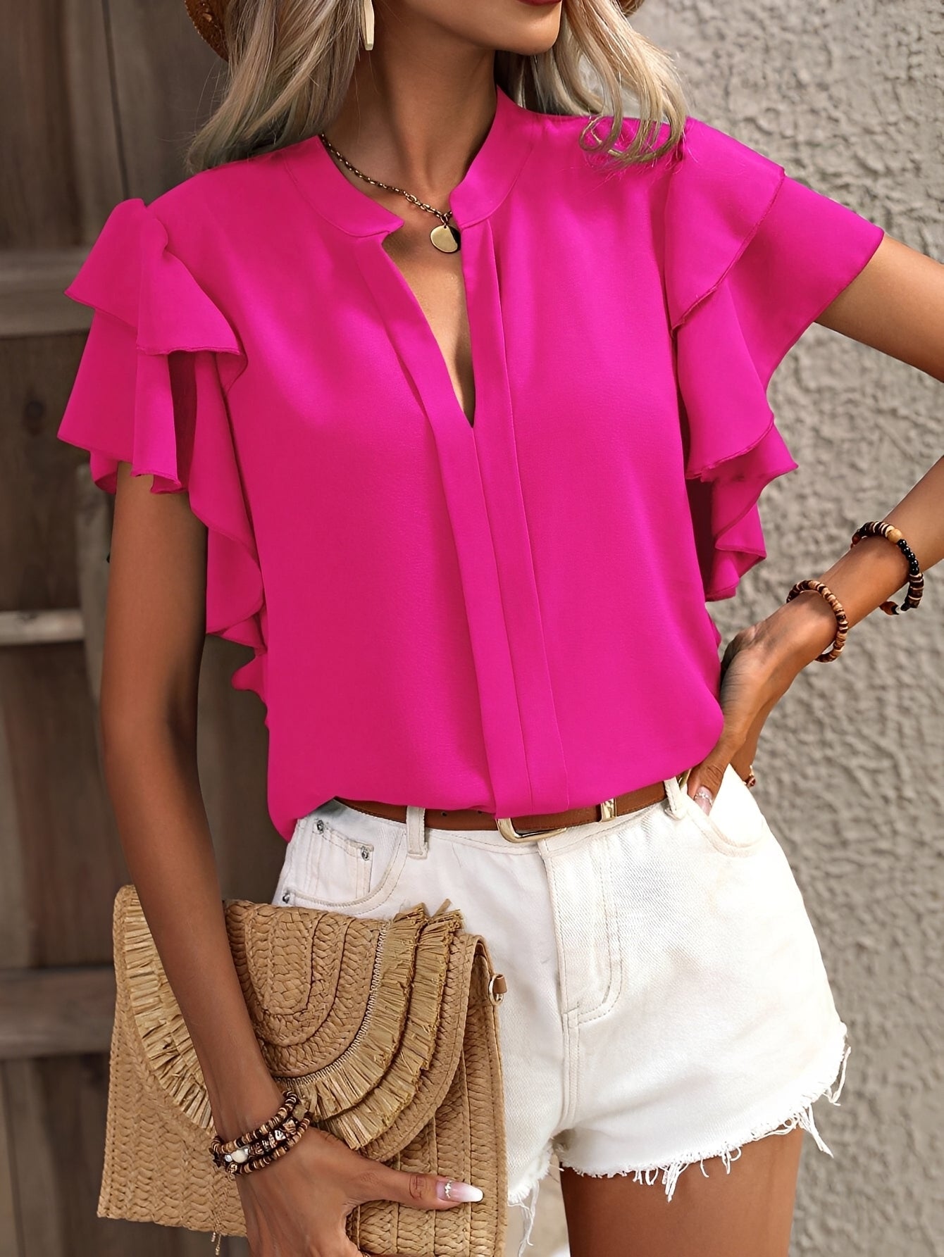 Louisa - Blouse à col en V sans manches
