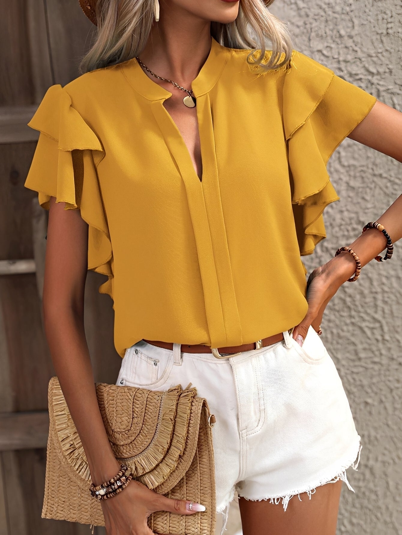 Louisa - Blouse à col en V sans manches