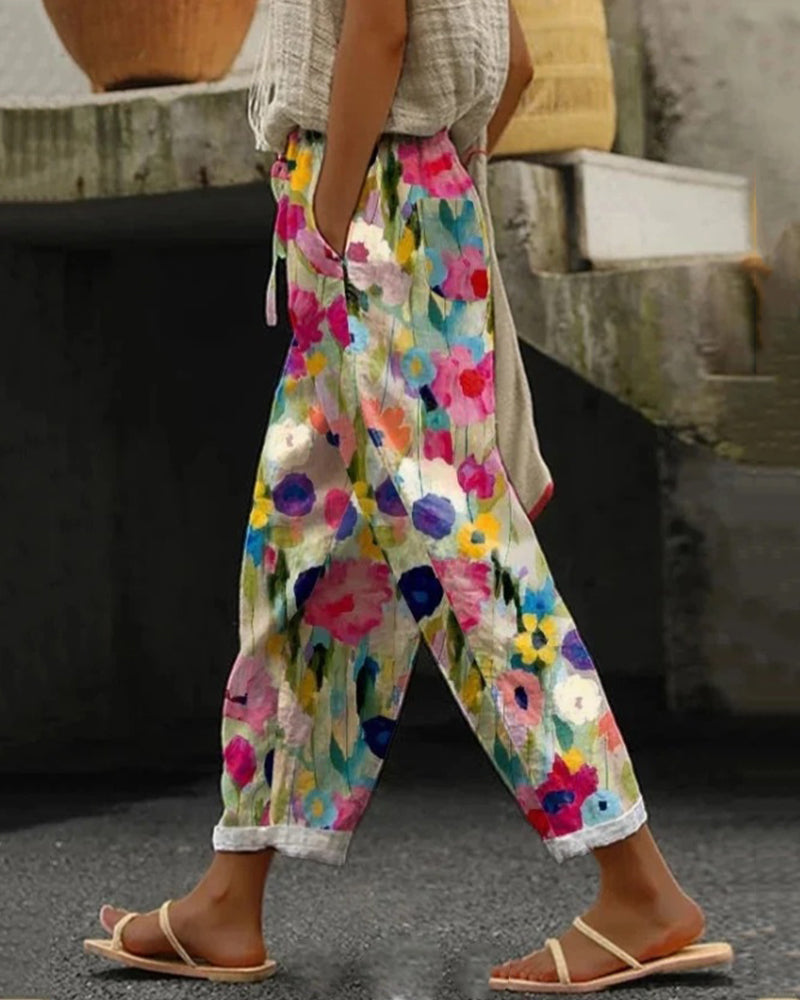 Selma – Pantalon fleuri large avec impression stylisée