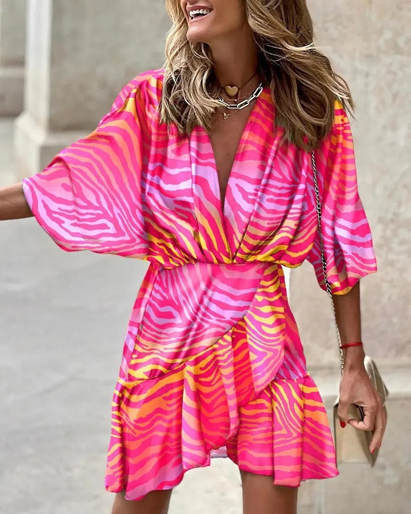 Niana - Élégante robe à décolleté en V avec motif vivant
